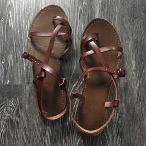 Brown strappy criss cross sandals